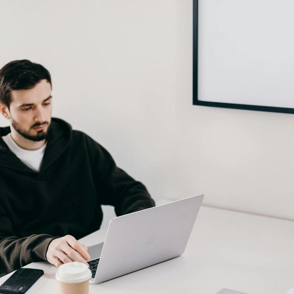 man working on laptop