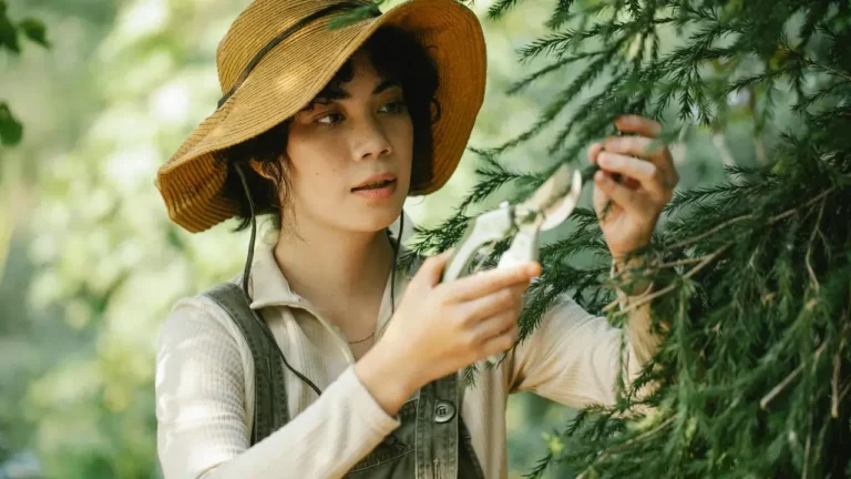 girl cutting tree