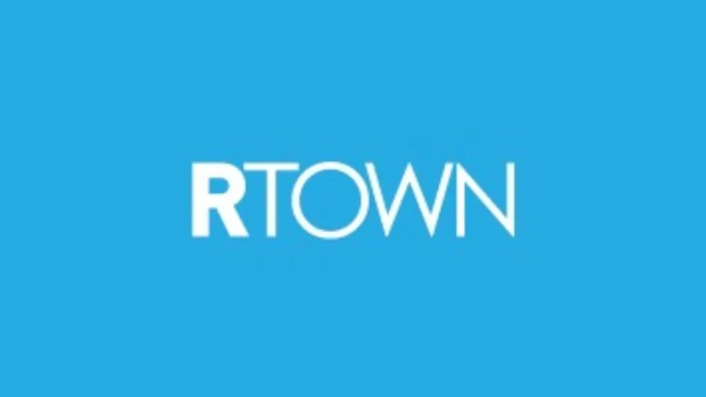 RTOWN logo with bold white text on a solid light blue background. The letter “R” is in uppercase block style, followed by the word “TOWN” in clean, modern font. Represents RTOWN Digital Agency, a Canadian marketing firm.