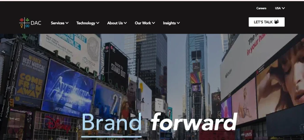 "DAC Group homepage featuring a cityscape with digital billboards and the tagline 'Brand forward,' highlighting their focus on data-driven media and marketing solutions."