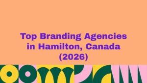 Featured banner image displaying the text “Top Branding Agencies in Hamilton, Canada (2026)” on a peach background with bold purple typography and colorful abstract geometric patterns along the bottom, representing a curated list of leading branding agencies in Hamilton, Canada.