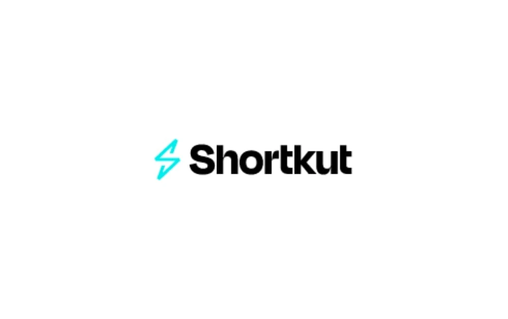 Shortkut agency logo with a bold black font and a turquoise electric 'S' symbol – a branding design for a growth-driven marketing solutions company.