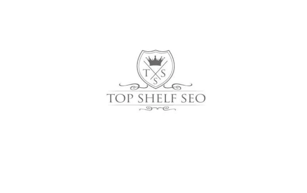 Top Shelf SEO logo — grayscale emblem with a shield and crown, reflecting a Winnipeg SEO agency known for helping local businesses grow their online presence.