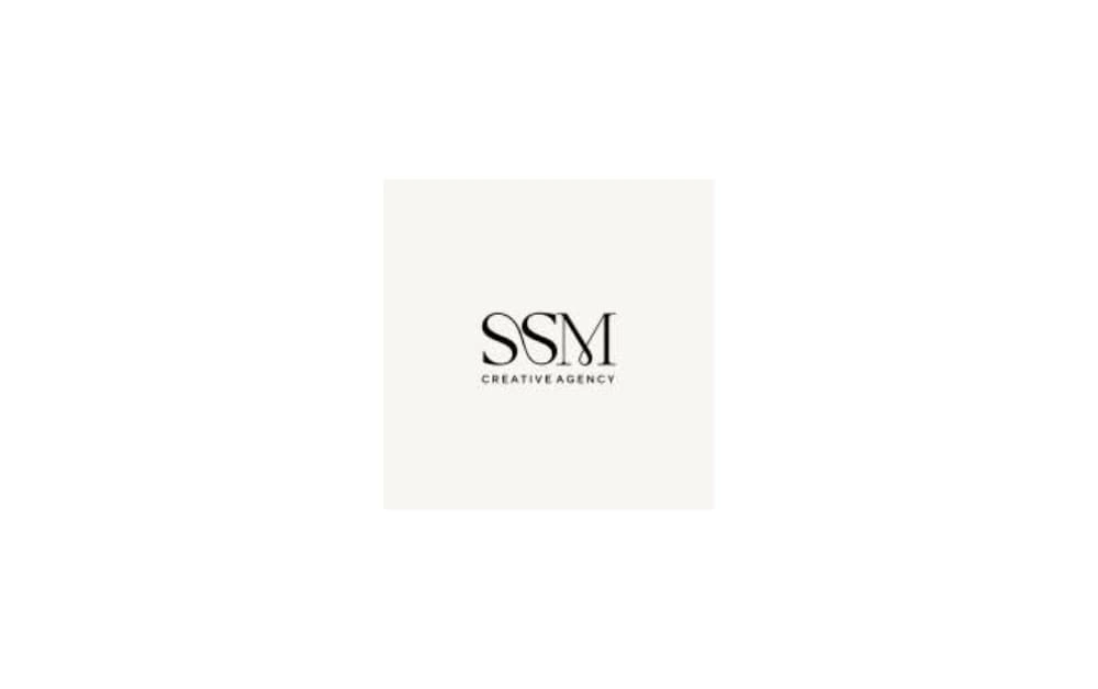 SSM Creative Agency logo with elegant black serif letters "SSM" and the subtitle “Creative Agency” on a light cream background.