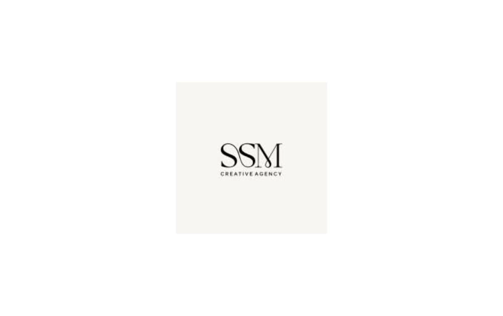 Minimalist logo of SSM Creative Agency with black serif text on a soft beige background.