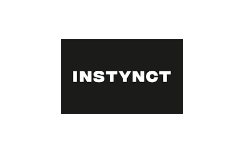 INSTYNCT logo with bold white text on a solid black background, conveying a strong and modern identity for a tech or branding agency.