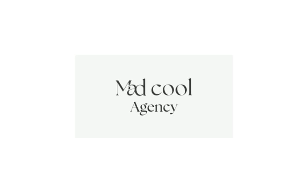 Minimalist logo of Mad Cool Agency with elegant black text on a white background, representing a creative branding and marketing firm known for modern design aesthetics.