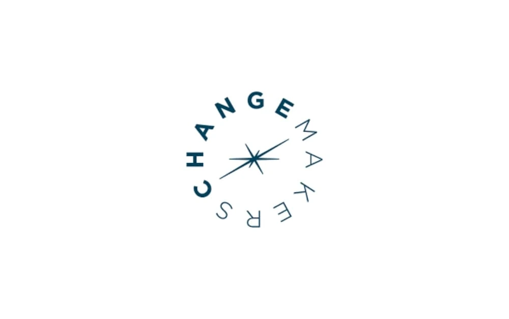 Circular logo for ChangeMakers with the word “CHANGEMAKERS” arranged around a starburst symbol in the center, representing strategic communication and branding.