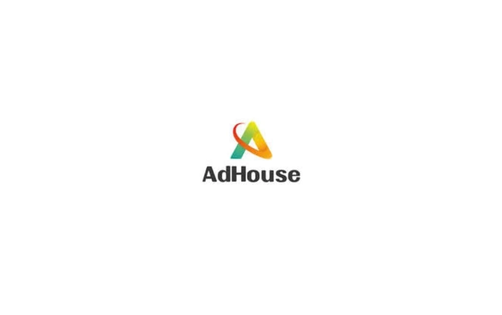AdHouse logo featuring a multicolored triangular “A” symbol in red, yellow, and green above the brand name in bold black text.