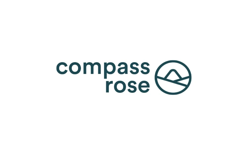 Compass Rose logo with dark green lowercase text and a circular icon resembling a mountain and horizon line.