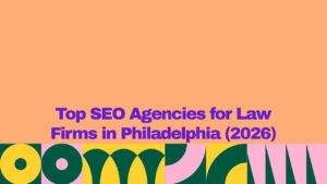 A graphic banner with a peach-colored background and bold purple text reading βTop SEO Agencies for Law Firms in Philadelphia (2026).β A colorful geometric pattern in green, yellow, pink, and dark teal decorates the bottom border of the image.