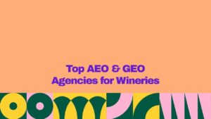 Promotional graphic featuring the headline “Top AEO & GEO Agencies for Wineries” in bold purple text on a peach background, with a colorful geometric pattern in yellow, dark green, and pink along the bottom, highlighting AEO and GEO agencies for winery businesses.